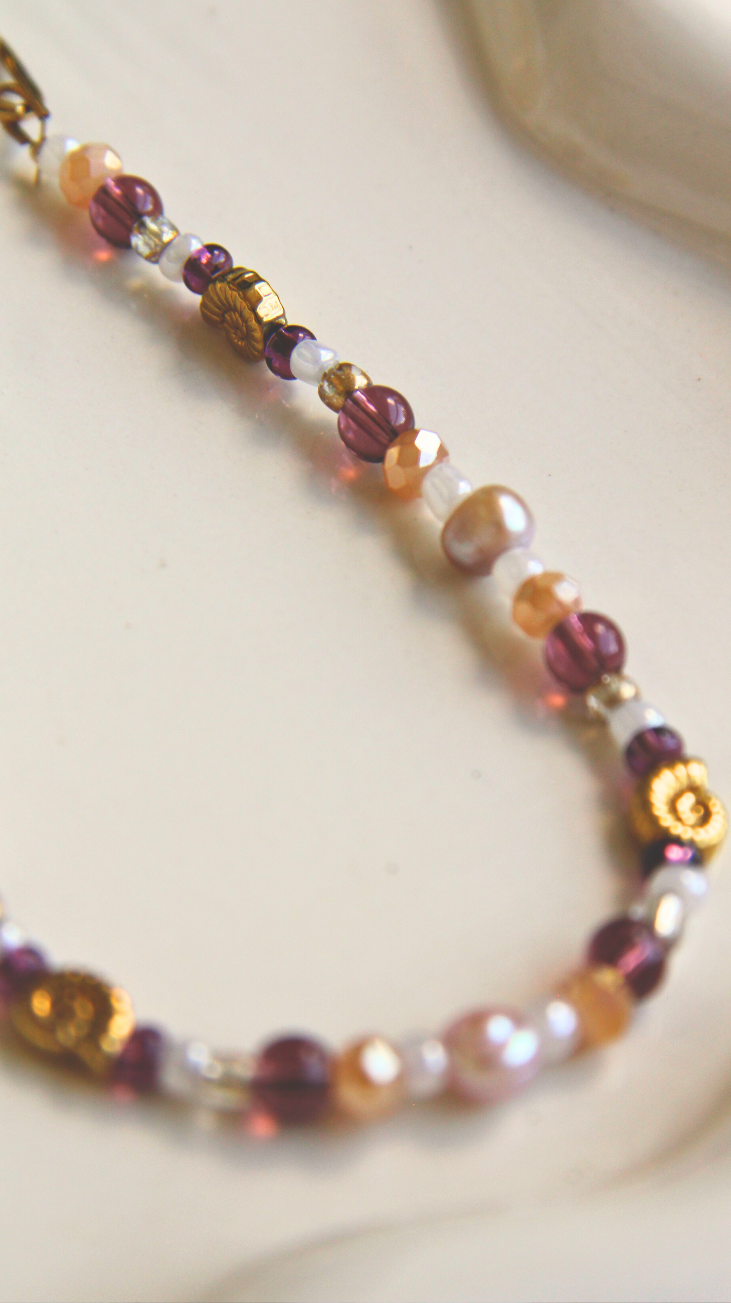 The Purple and Pearl Necklace