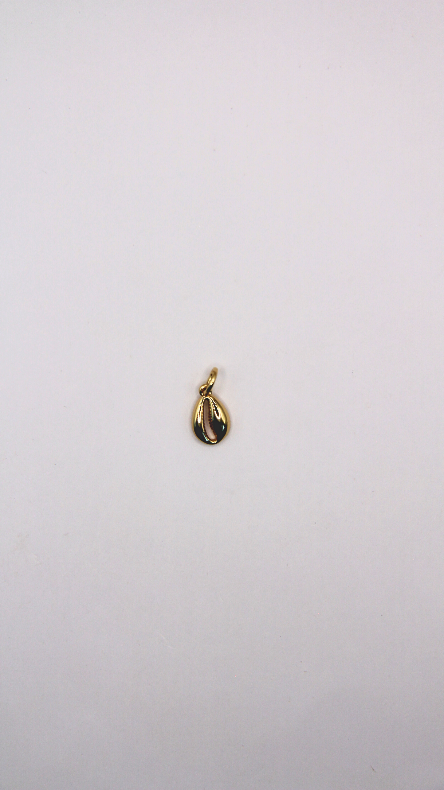 The Gold Cowrie Shell Charm