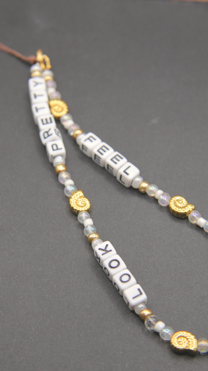 The FSLP Gold Phone Chain