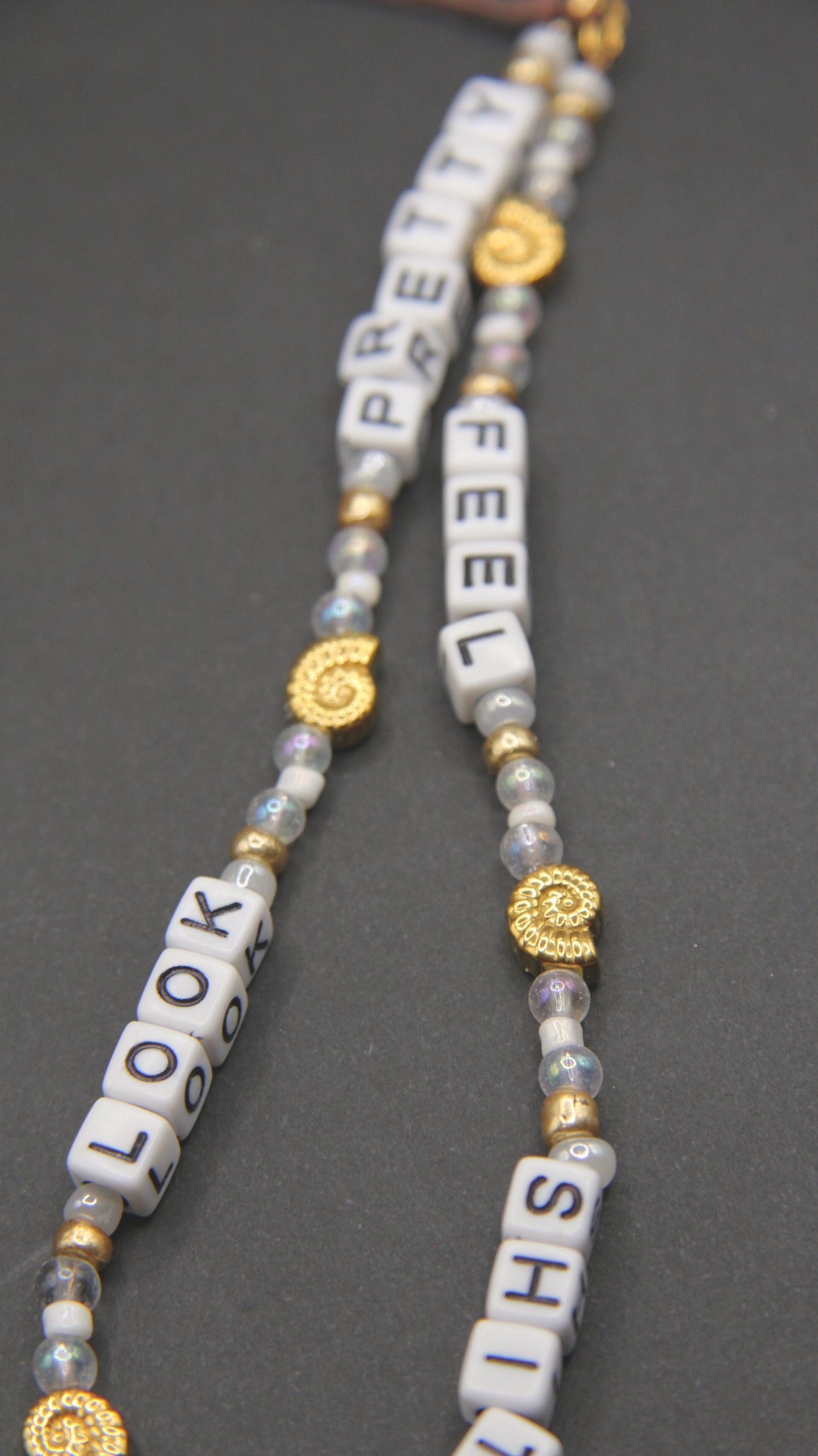 The FSLP Gold Phone Chain