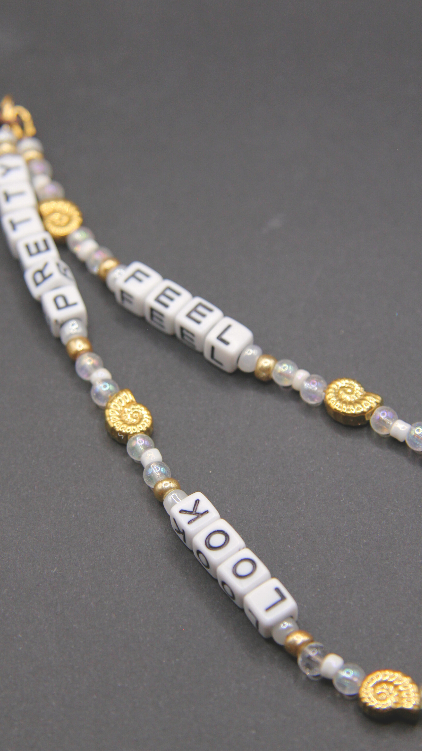 The FSLP Gold Phone Chain