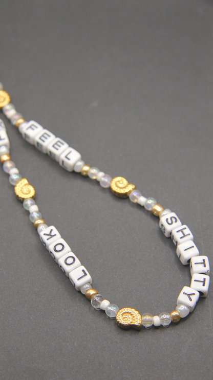 The FSLP Gold Phone Chain