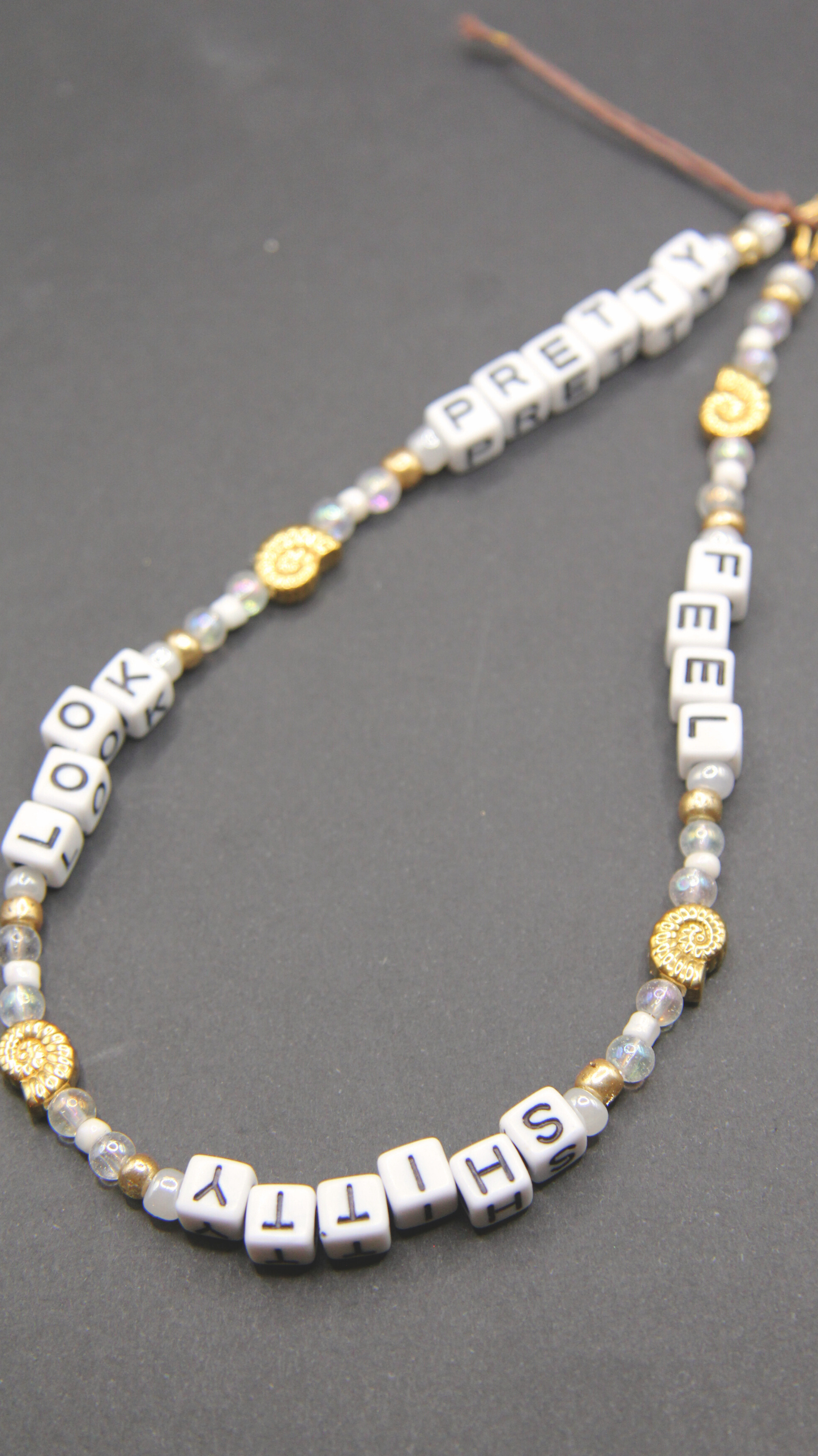 The FSLP Gold Phone Chain