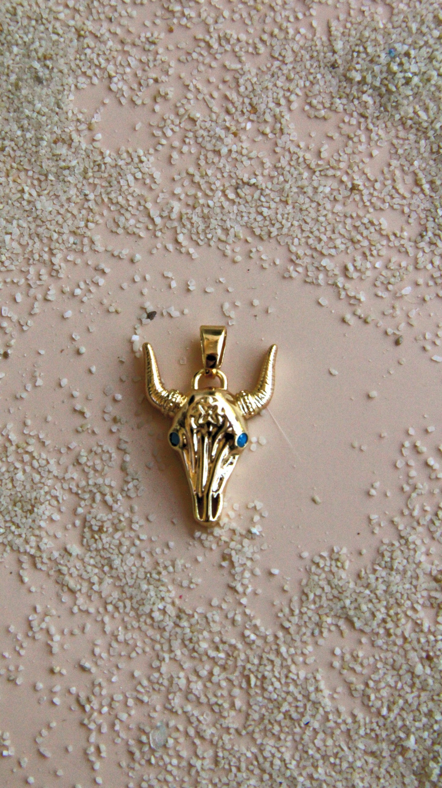 The Turquoise Bull Charm