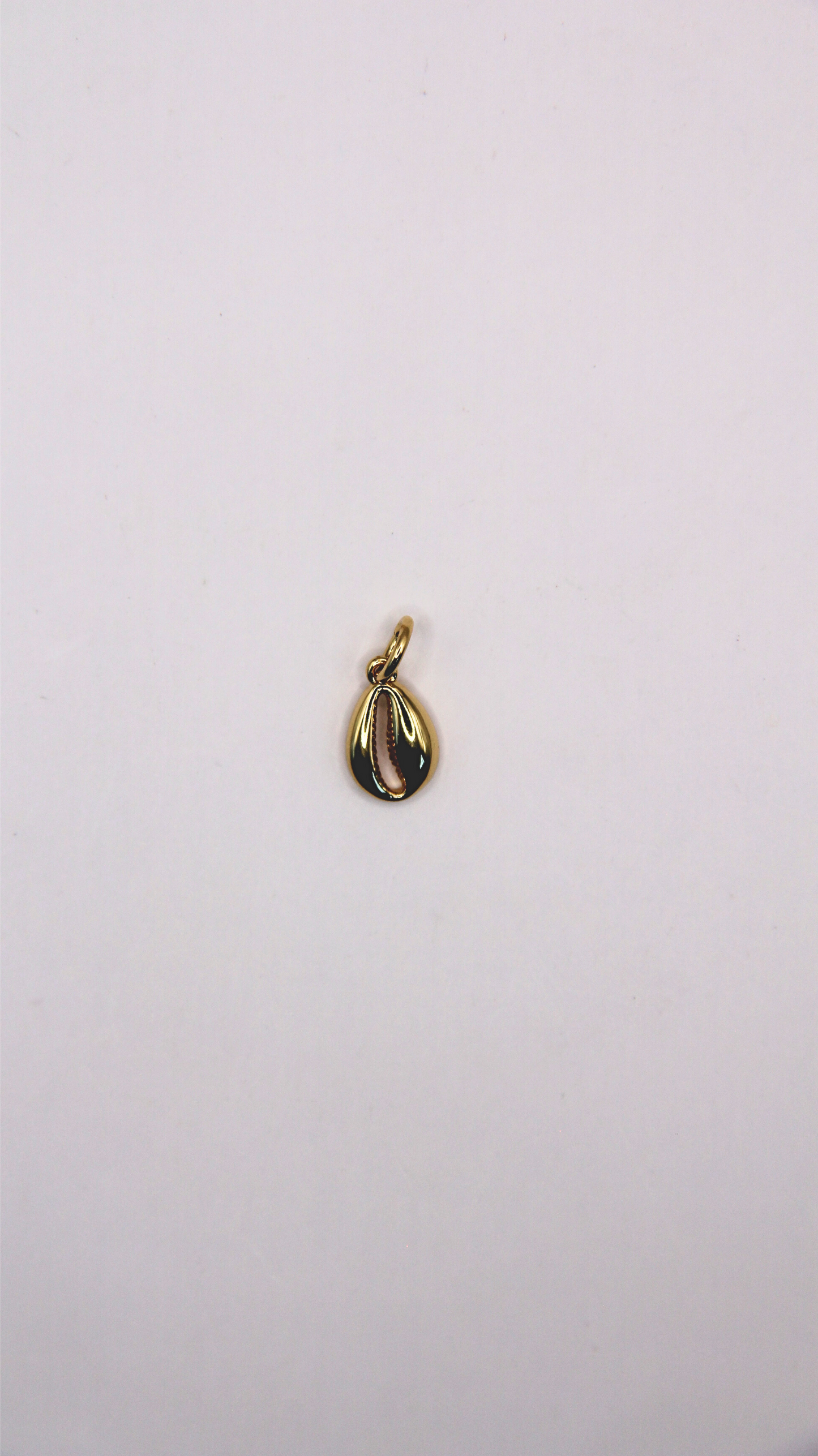 The Gold Cowrie Shell Charm